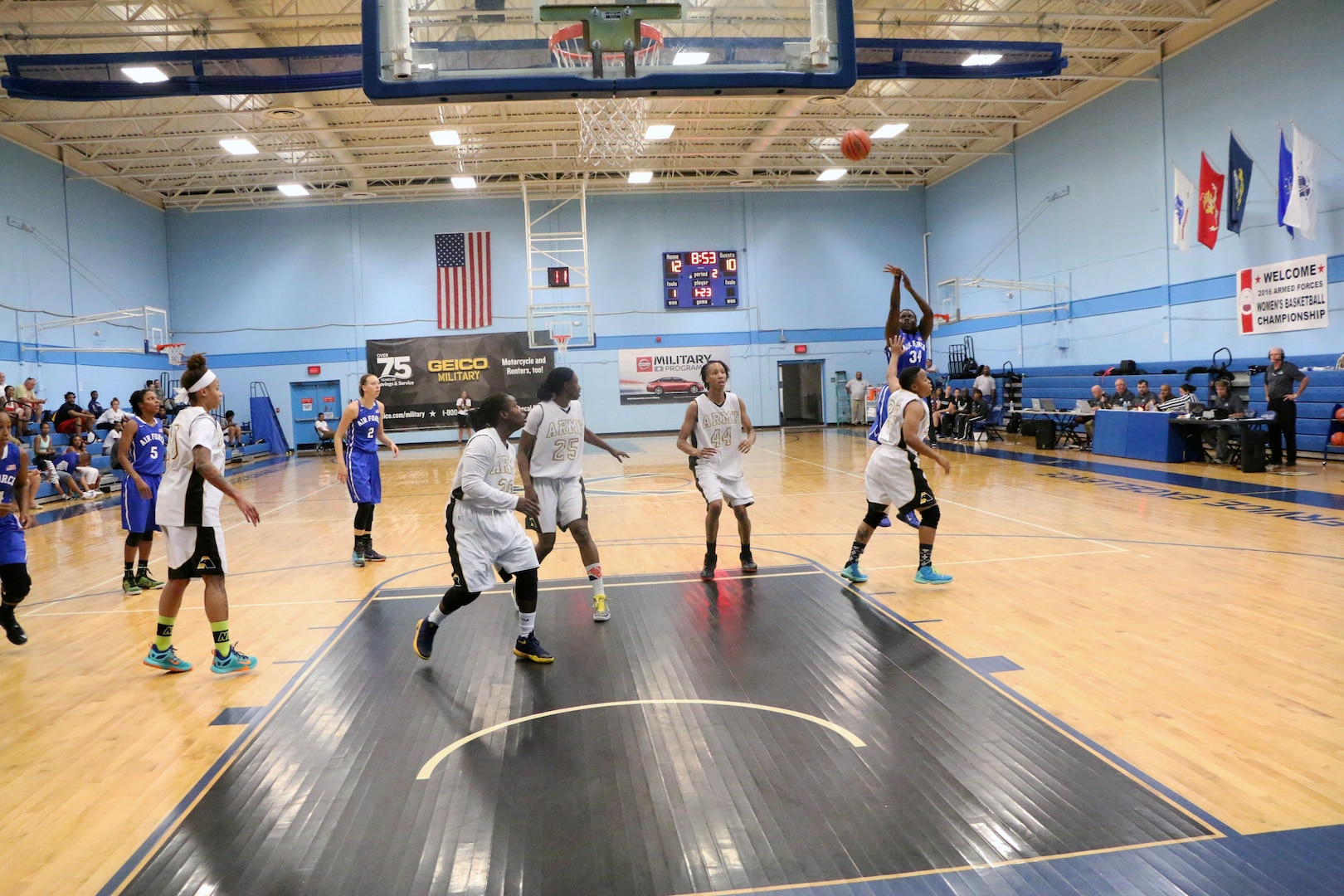 Air Force Staff Sgt. Charmaine Clark (#34) of Robins AFB, Ga. hits the jumper against Army during game six of the 2016 Armed Forces Women's Basketball Championship at Joint Base San Antonio-Lackland AFB, Texas on 3 July.  Army would win the contest 70-55.