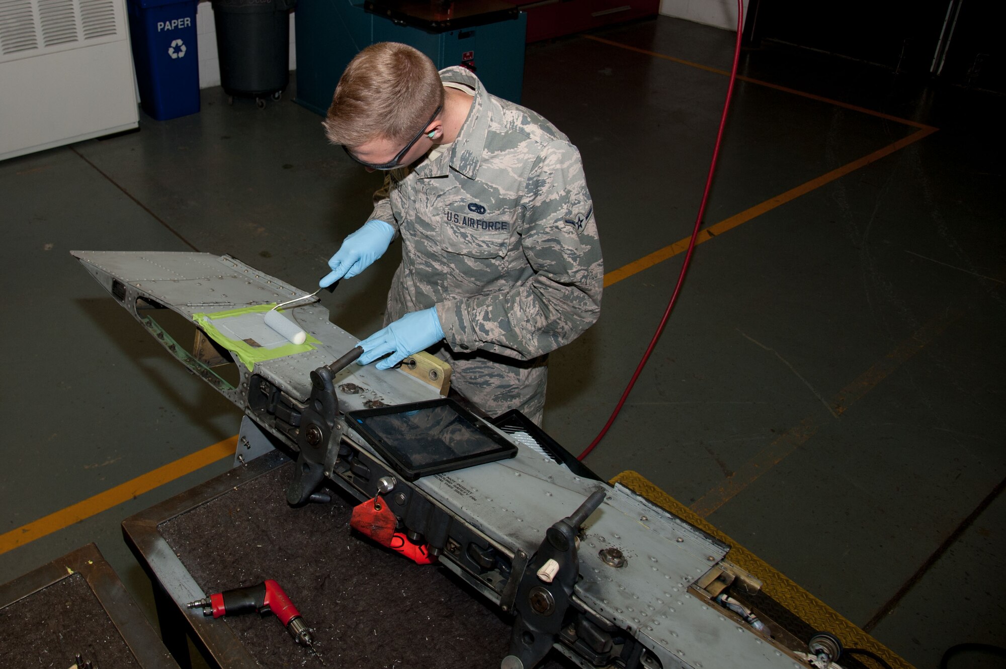 Airman Jared Chappell, 51st Maintenance Squadron aircraft structural maintenance, paints an A-10 Thunderbolt II pylon after repairing a crack at Osan Air Base, Republic of Korea, June 28, 2016. Chappell was repairing a crack in the pylon to return it to full mission capability. Chappell is assigned to structural maintenance shop and is part of the fabrication flight which also has non-destructive inspection and metals technology. Fabrication flight Airmen identify, repair and build parts to working order so that Osan airframes are ready to fight tonight.  (U.S. Air Force photo by Staff Sgt. Jonathan Steffen/Released)