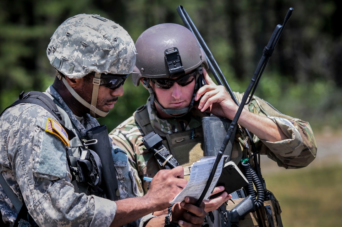 Soldiers transmit a 9-line medevac request during Exercise Gridiron at Joint Base McGuire-Dix-Lakehurst, N.J., June 27, 2016. Air National Guard photo by Tech. Sgt. Matt Hecht