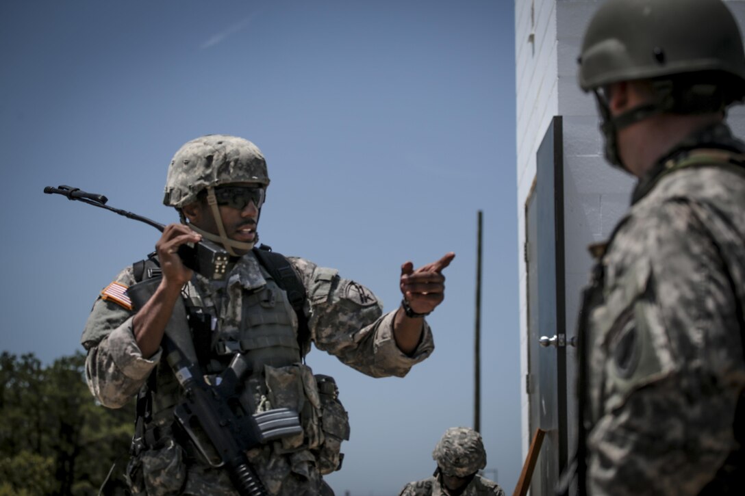 A U.S. Army Reserve Soldier from the 404th Civil Affairs Battalion coordinates aviation support during Exercise Gridiron at Joint Base McGuire-Dix-Lakehurst, N.J., June 27, 2016. (U.S. Air National Guard photo by Tech. Sgt. Matt Hecht/Released)