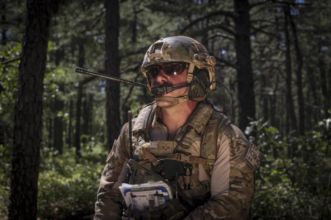 U.S. Air Force Tactical Air Control Party Senior Airman Ryan Muller from the New Jersey Air National Guard's 227th Air Support Operations Squadron poses for a portrait during Exercise Gridiron at Joint Base McGuire-Dix-Lakehurst, N.J., June 27, 2016. The 227th ASOS supported the 404th Civilian Affairs Battalion training exercise. (U.S. Air National Guard photo by Tech. Sgt. Matt Hecht/Released)