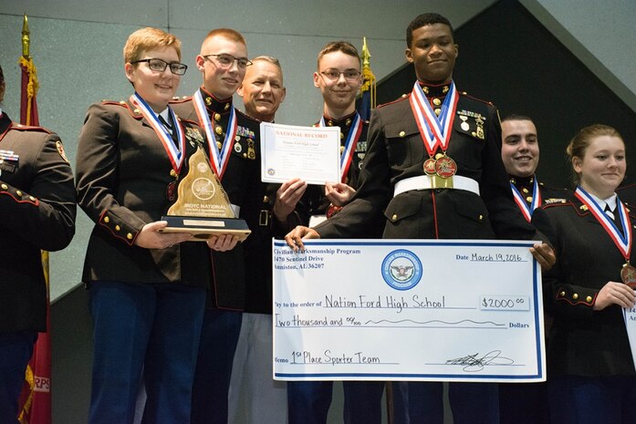 18  Mar 2016,  PERRY, OH – In precision action during the 2016 JROTC National Championship, Marine Corps teams took first and third place, with East Coweta High School MCJROTC from East Coweta, Georgia earning top honors for the second year in a row.    Recording an overall aggregate score of 4694-307x, the team also set a Marine Corps and Overall National Record for recording a score of 2356-165x.