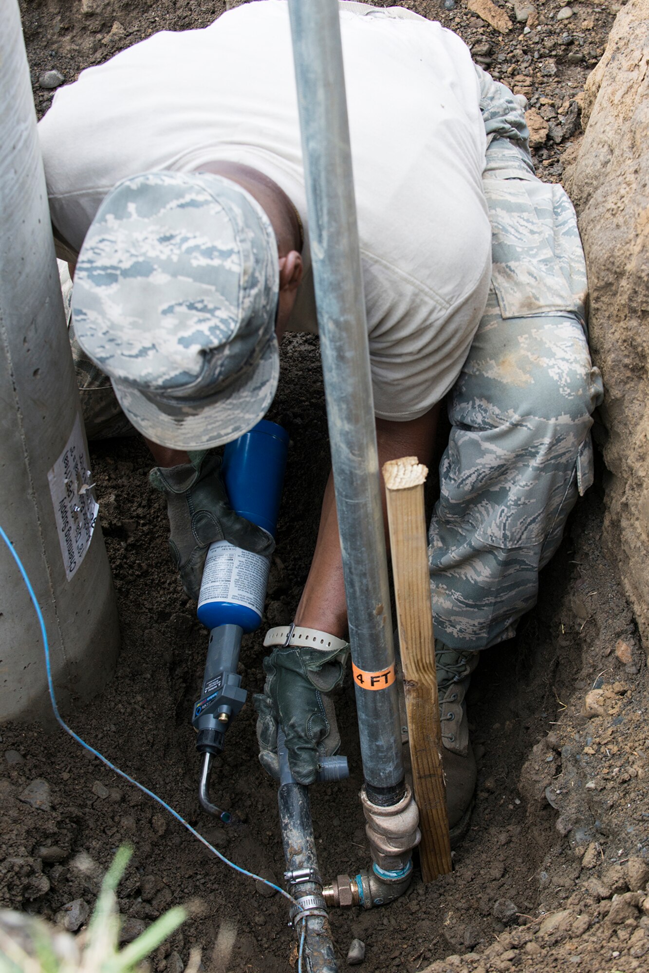 A U.S. Air Force Airman from the 307th Civil Engineering Squadron (CES) uses a torch to connect a water line at the Chenango County Fairgrounds, Norwich, N.Y., June 29, 2016. The 307th CES is an Air Force Reserve squadron assigned under the 307th Bomb Wing at Barksdale Air Force Base, La., and is in Norwich to participate in a community restoration project in support of the Innovative Readiness Training Program.  (U.S. Air Force photo by Master Sgt. Greg Steele/Released)