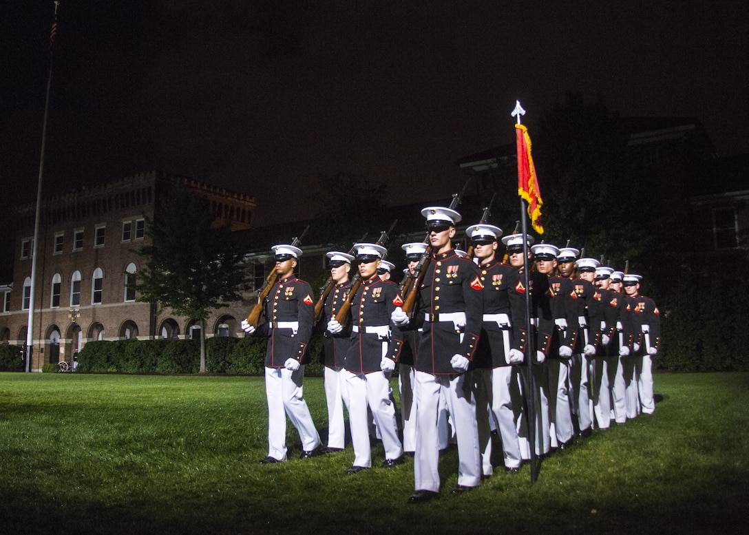 Marines from Bravo Co., Marine Barracks Washington, D.C., perform during the Friday Evening Parade, July 1, 2016. The guest of honor for the parade was the Honorable Richard M. Burr and the Honorable Thom Tillis, United States Senators from North Carolina. The hosting official was Lt. Gen. Jon M. Davis, deputy commandant for aviation. (Official Marine Corps photo by Lance Cpl. Robert Knapp/Released)