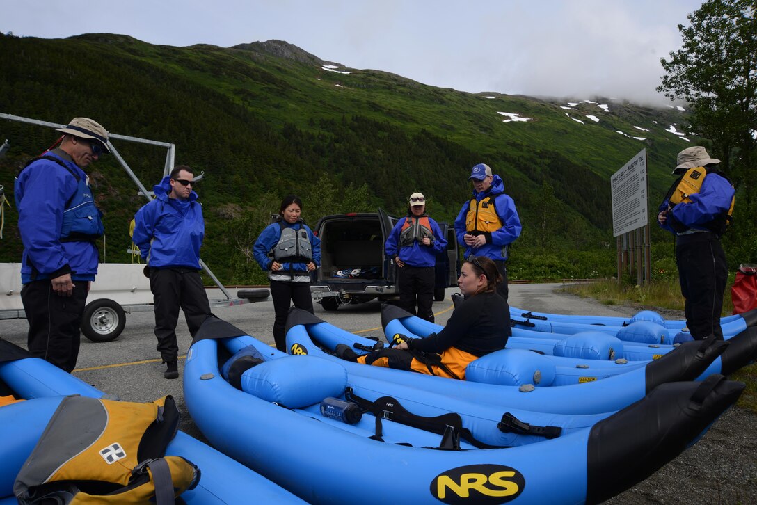 Participants of the first Outdoor Recreation Program inflatable kayaking trip prepare to leave for Portage River, Alaska, June 12, 2016. This trip was the first time some of the participants have kayaked in Alaska and some of the kayaks have hit the water. The OAP has introduced inflatable kayaking as the newest addition to the multiple trips available in the summer. (U.S. Air Force photo by Airman 1st Class Christopher R. Morales)