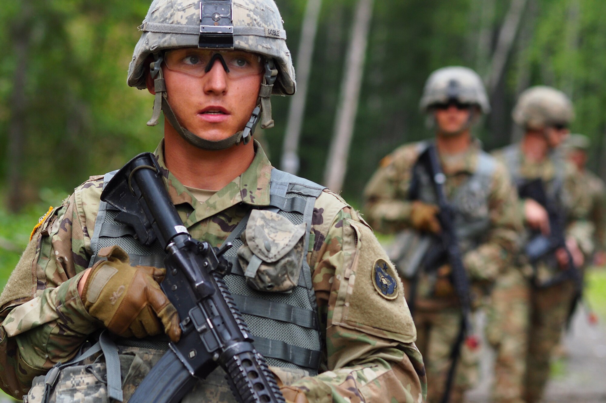 Spc. Colton Gobel, a native of Touchet, Wash., assigned to the 539th Composite Truck Company (Light), 17th Combat Sustainment Support Battalion, U.S. Army Alaska, leads his team on point through a Situation Exercise Training lane during the Ready Warrior Competition at Camp Madbull on Joint Base Elmendorf-Richardson, Alaska, Thursday, June 23, 2016.  The three-day competition tested teams of Soldiers in physical fitness, small arms proficiency, land navigation, and small-unit tactics as well as other Soldier skills. (U.S. Air Force photo/Justin Connaher)