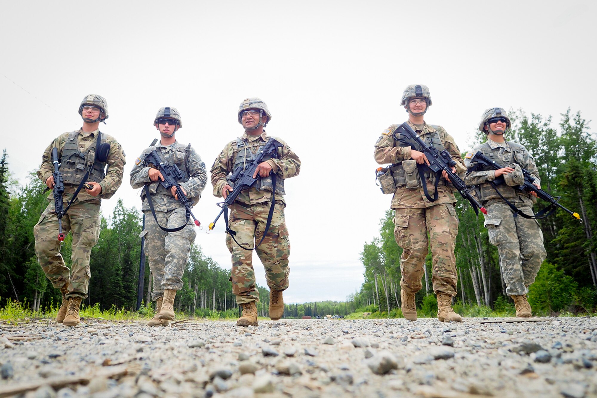 Soldiers assigned to the 17th Combat Sustainment Support Battalion, U.S. Army Alaska, walk to the start point of a Situation Exercise Training lane during the Ready Warrior Competition at Camp Madbull on Joint Base Elmendorf-Richardson, Alaska, Thursday, June 23, 2016.  The three-day competition tested teams of Soldiers in physical fitness, small arms proficiency, land navigation, and small-unit tactics as well as other Soldier skills. (U.S. Air Force photo/Justin Connaher)
