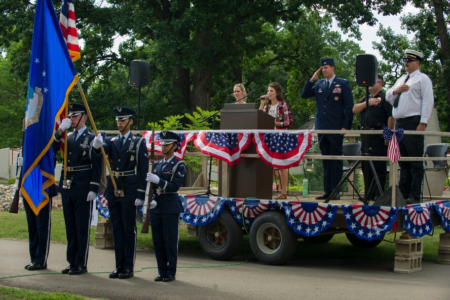 The Minot Air Force Base Honor Guardsmen present the colors at Minot’s 2016 4th of July Festival at Roosevelt Park in Minot, N.D., July 4. The ceremony also featured a speech from 5th Bomb Wing Commander Col. Matthew Brooks. (U.S. Air Force photo/Senior Airman Apryl Hall)