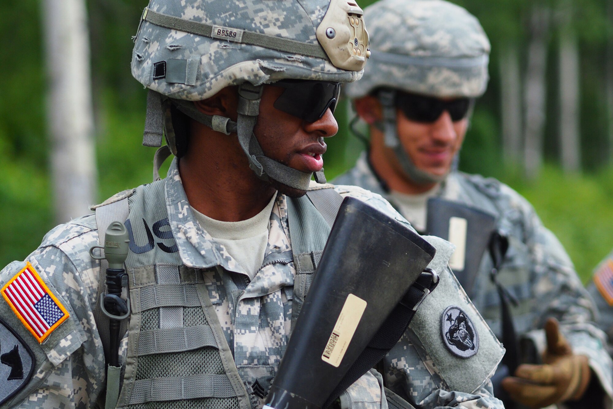 Army Sgt. Michael Barnes, a native of Minneapolis, Minn., assigned to the 574th Quartermaster Company, 17th Combat Sustainment Support Battalion, U.S. Army Alaska, waits with his team before a Situation Exercise Training lane during the Ready Warrior Competition at Camp Madbull on Joint Base Elmendorf-Richardson, Alaska, Thursday, June 23, 2016.  The three-day competition tested teams of Soldiers in physical fitness, small arms proficiency, land navigation, and small-unit tactics as well as other Soldier skills. (U.S. Air Force photo/Justin Connaher)