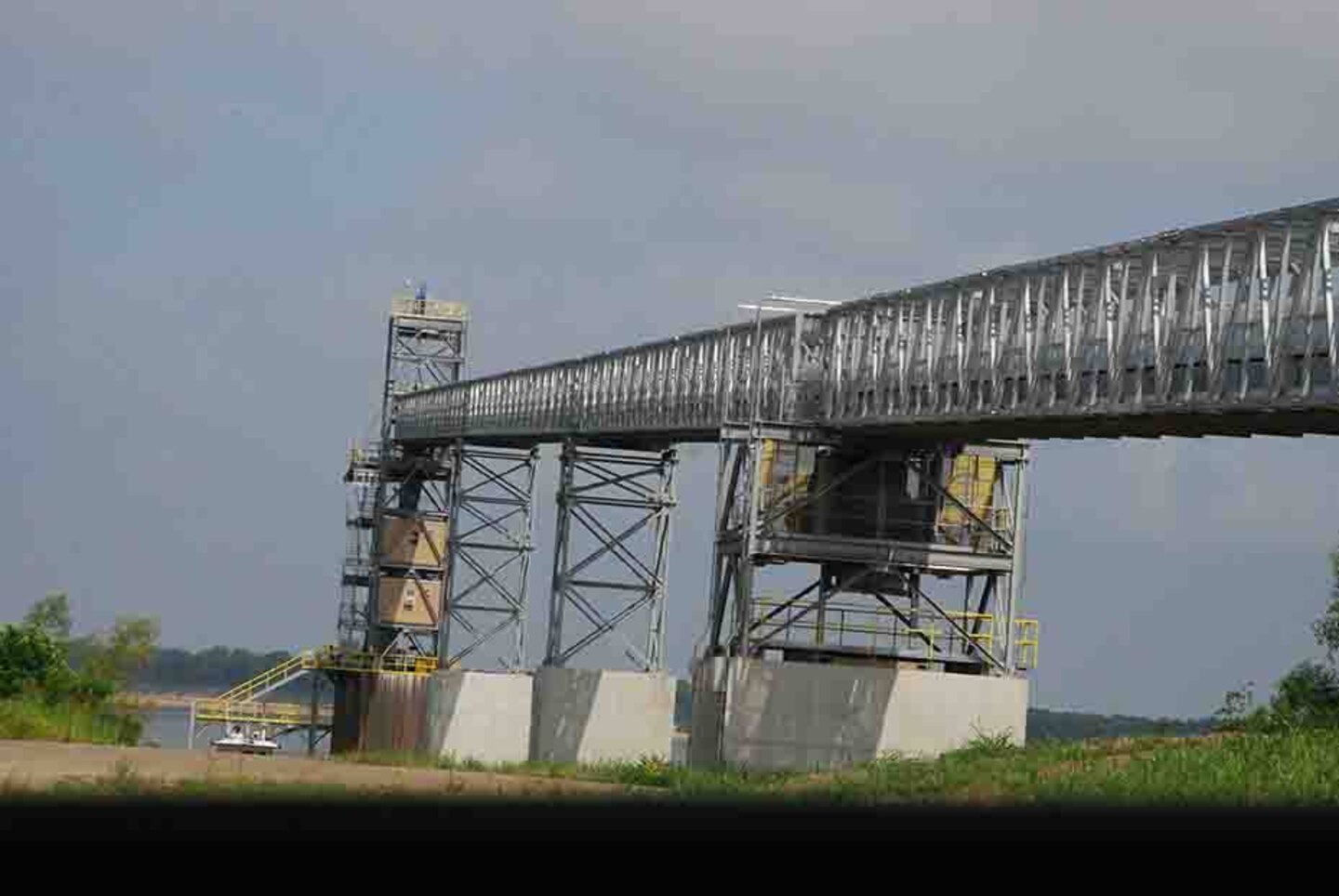 Because of the distance between the riverbank and the Mhoon Landing gage, engineers must walk across a large ramp to access the gage site.
