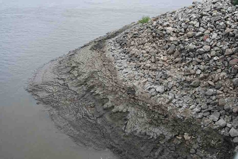 The sediment build up at the Tunica gage site covers the gage and prevents it from reading pressure levels in the river.