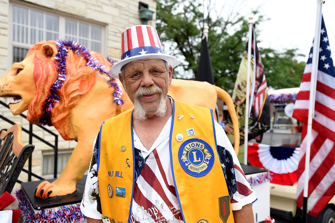 “Wild Bill” Reeves, a resident of Villa Park, stands in front of the Villa Park Lions Club float before the start of the annual Fourth of July Parade in Villa Park, July 4, 2016. Reeves is a Vietnam veteran and former Prisoner of War. He served in the U.S. Army from 1969 to 1972. He was stationed in Chu Lai and served as a door gunner on a Huey helicopter.
(U.S. Army photo by Spc. David Lietz/Released)