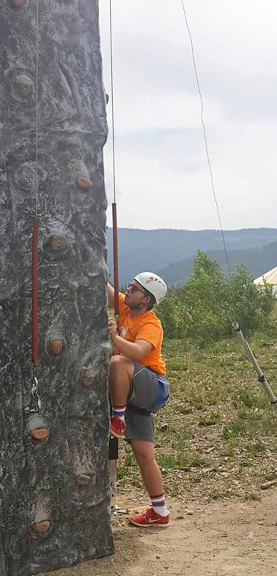 A member of the Youth Leadership Camp, sponsored by Air Force Services Agency Child and Youth Programs and hosted by Buckley Air Force Base, climbs the rock wall obstacle during a challenge June 27 – July 1 at the Snow Mountain Ranch in Granby, Colo. Youth from around the world came together to learn leadership techniques and build confidence for their future years of high school and beyond. (U.S. Air Force photo by Tech. Sgt. Nicholas Rau)