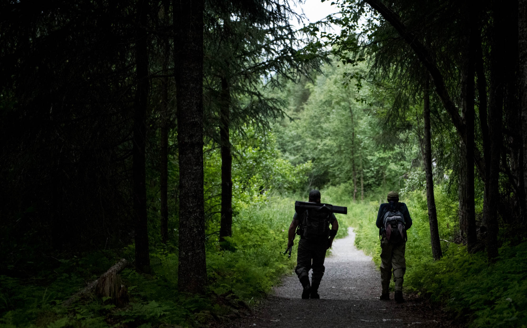 Army veteran Dustin Slinker walks toward the Russian River on the Kenai Peninsula with his young protégé, June 28. Joint Base Elmendorf-Richardson’s location offers a variety of summer activities. Alaska has some of the most unique fishing opportunities in the world, to find out more information on fishing opportunities in the Anchorage area, contact Outdoor Recreation at 552-2023. (U.S. Air Force photo by Senior Airman Kyle Johnson)