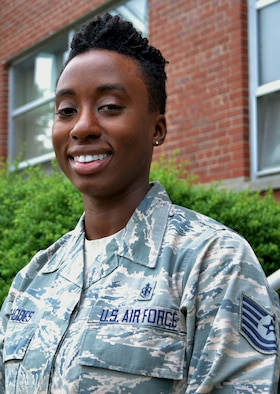 Tech. Sgt. Elisha Rhodes, a recruiter with the 111th Attack Wing's Strength Management Team, stands for photo at Horsham Air Guard Station, Pa., July 5, 2016. Rhodes is one the newest recruiters on the SMT here and has a background in the medical field from her time in the active-duty Air Force. (U.S. Air National Guard photo by Tech. Sgt. Andria Allmond)