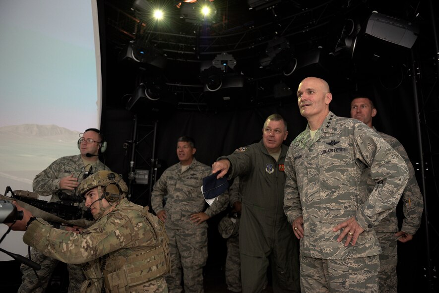 U.S. Air Force Gen. Carlton D. Everhart II, Air Mobility Command commander, watches a demonstration of the Air National Guard Advanced Joint Terminal Attack Controller Training System during a tour of the 182nd Airlift Wing, Illinois Air National Guard, in Peoria, Ill., June 28, 2016. The tour marked Everhart’s first visit to the C-130 Hercules wing since becoming commander of AMC. (U.S. Air National Guard photo by Staff Sgt. Lealan Buehrer)