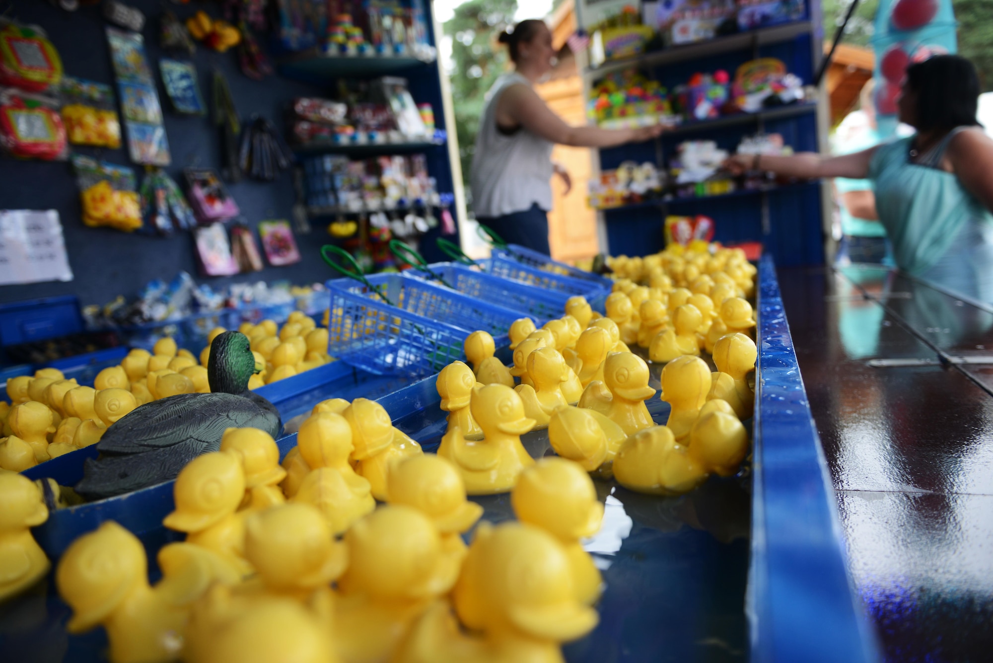 Rubber ducks float in the water at a kiosk during the Freedom Fest 2016 at Ramstein Air Base, Germany, July 4, 2016. The Independence Day celebration included a variety of foods, games, rides and fireworks for Kaiserslautern Military Community members. (U.S. Air Force Photo/ Airman 1st Class Joshua Magbanua)