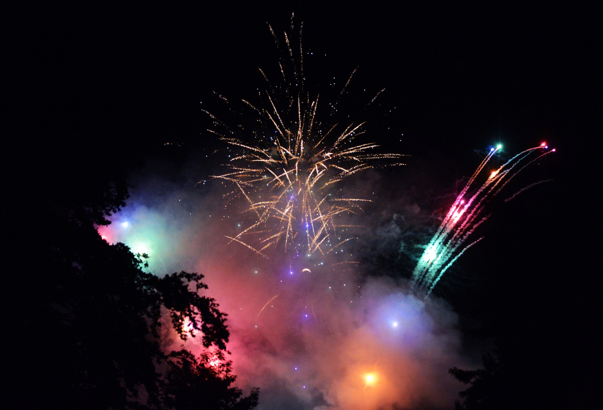 Fireworks shoot up into the air during Freedom Fest 2016 at Ramstein Air Base, Germany, July 4, 2016. The Independence Day celebration included a variety of foods, games, rides and fireworks for Kaiserslautern Military Community members. (U.S. Air Force photo/ Airman 1st Class Joshua Magbanua)