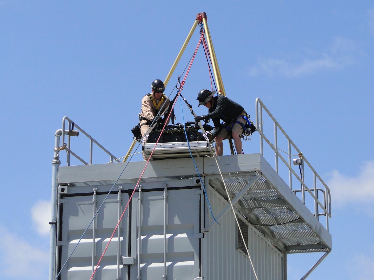 The California National Guard's 9th Civil Support Team (CST) tests a 
platform and hoist system the team designed for the QinetiQ Talon robot 
during a May exercise in San Diego focused on preventing international 
smuggling of radiation sources. The Los Alamitos-based CST specializes in
responding to incidents involving a chemical, biological, radiological or
nuclear contaminant. 