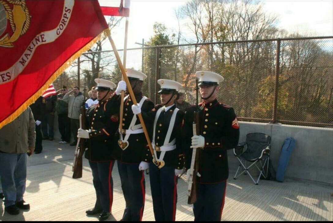 New Cumberland, Pennsylvania — U.S. Marine Corps Sgt. Hortencia H. Magana takes part in a Marine color guard during a bridge dedication ceremony to a fallen Vietnam Marine Saturday, Nov. 14, 2015 in Bensalem, Penn. “Being able to contribute to the local communities that support the military is a great thing and an important duty,” said Magana, an administrative specialist currently serving at Recruiting Station Harrisburg, Penn. “Having that support means a lot to us, and it shows us serving that people appreciate our sacrifice.” The Marines from right to left: Cpl. Matthew S. Myers, Sgt. Magana, Sgt. Lloyd N. Boyde, and Sgt. Manuel Cardenas. (Courtesy photo/Released)