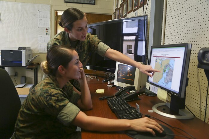 Cpl. Breann Gonzalez, meteorological forecaster with Headquarters and Headquarters Squadron, checks the weather at Base Operations on Marines Corps Air Station New River June 16. Safety is the top priority with METOC, as they keep a watchful eye on weather forecasts and reports, ensuring personnel and aircraft can continue training. (U.S. Marine Corps photo by Cpl. Mark Watola /Released)