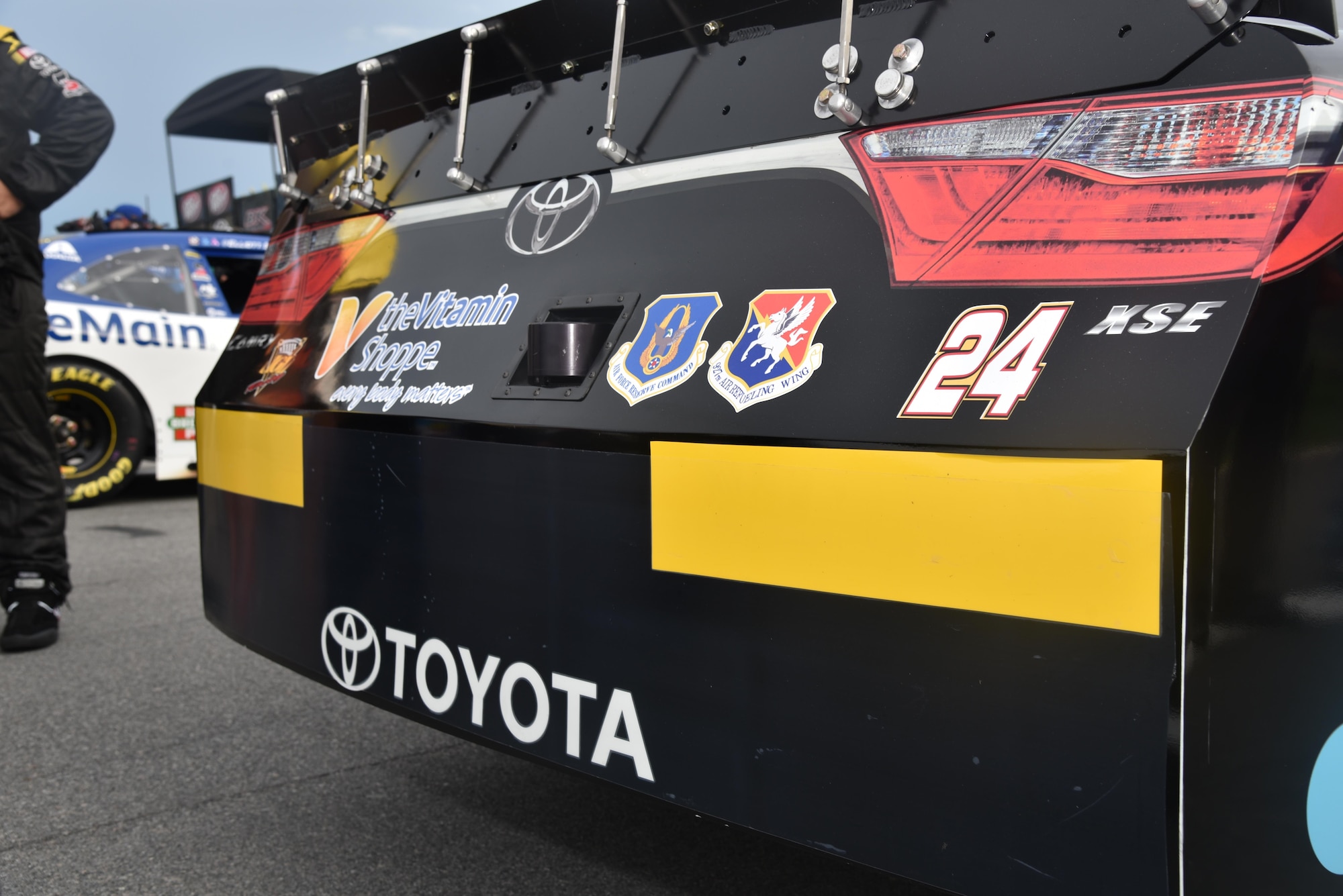 Airmen assigned to the 927th Air Refueling Wing, MacDill Air Force Base, Fla., were invited to participate in the honorary pit crew experience at the Coke Zero 400 NASCAR race at the Daytona International Speedway, Friday, July 1, 2016. Each Airmen and their guest were offered a chance to turn a wrench on a racecar and watch the team as they changed the tires and prepared the cars for the race. (U.S. Air Force photo by Staff Sgt. Adam C. Borgman)

