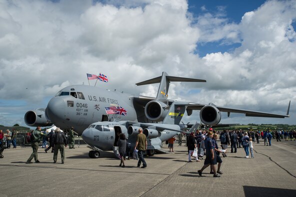 Attendees of the Yeovilton, England crowd around the 315th Airift Wing's mini C-17 and a Charleston C-17 Globemaster III July 2. This was the mini C-17's first trip across the pond and was a huge hit at Yeovilton Air Day 2016. This is the 315th AWs second time visiting Royal Naval Air Station Yeovilton, England, and the mighty presence of the mini C-17 helped seal the deal for another “Best Static Display” award. The miniature C-17 has been used all across the United States to promote the Air Force Reserve and bolster recruiting efforts at air shows, parades and other community events. 
(U.S. Air Force photo by Master Sgt. Shane Ellis)