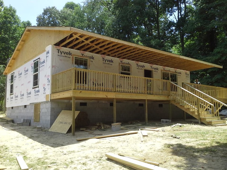 Huntsville Center employees built a new home for a deserving family through Mountain Outreach. When the team leaves after a week, the house is a "dried and lockable structure." 