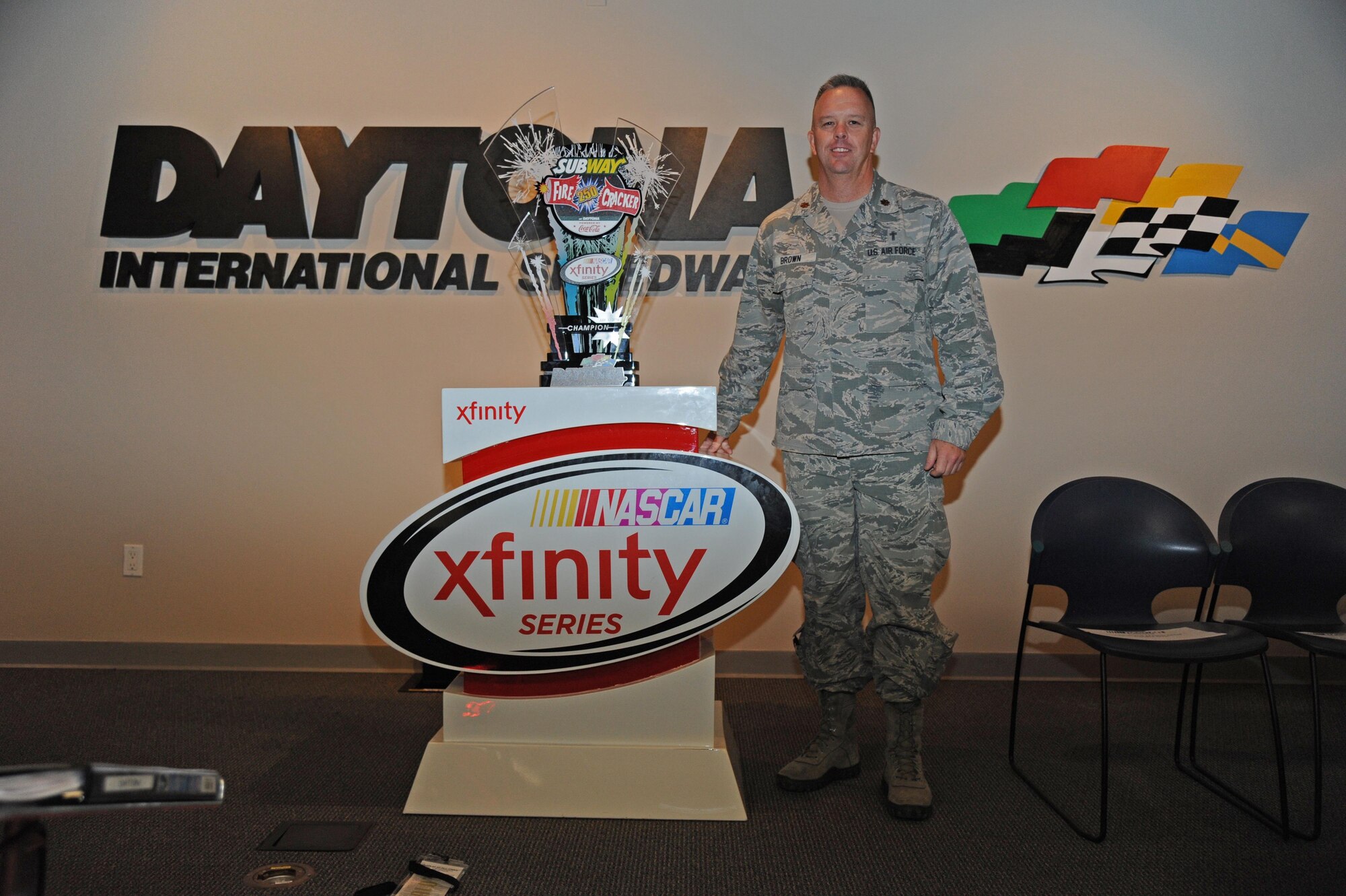 Airmen assigned to the 927th Air Refueling Wing, MacDill Air Force Base, Fla., were invited to participate in the honorary pit crew experience at the Coke Zero 400 NASCAR race at the Daytona International Speedway, Friday, July 1, 2016. Each Airmen and their guest were offered a chance to turn a wrench on a racecar and watch the team as they changed the tires and prepared the cars for the race. (U.S. Air Force photo by Staff Sgt. Adam C. Borgman)

