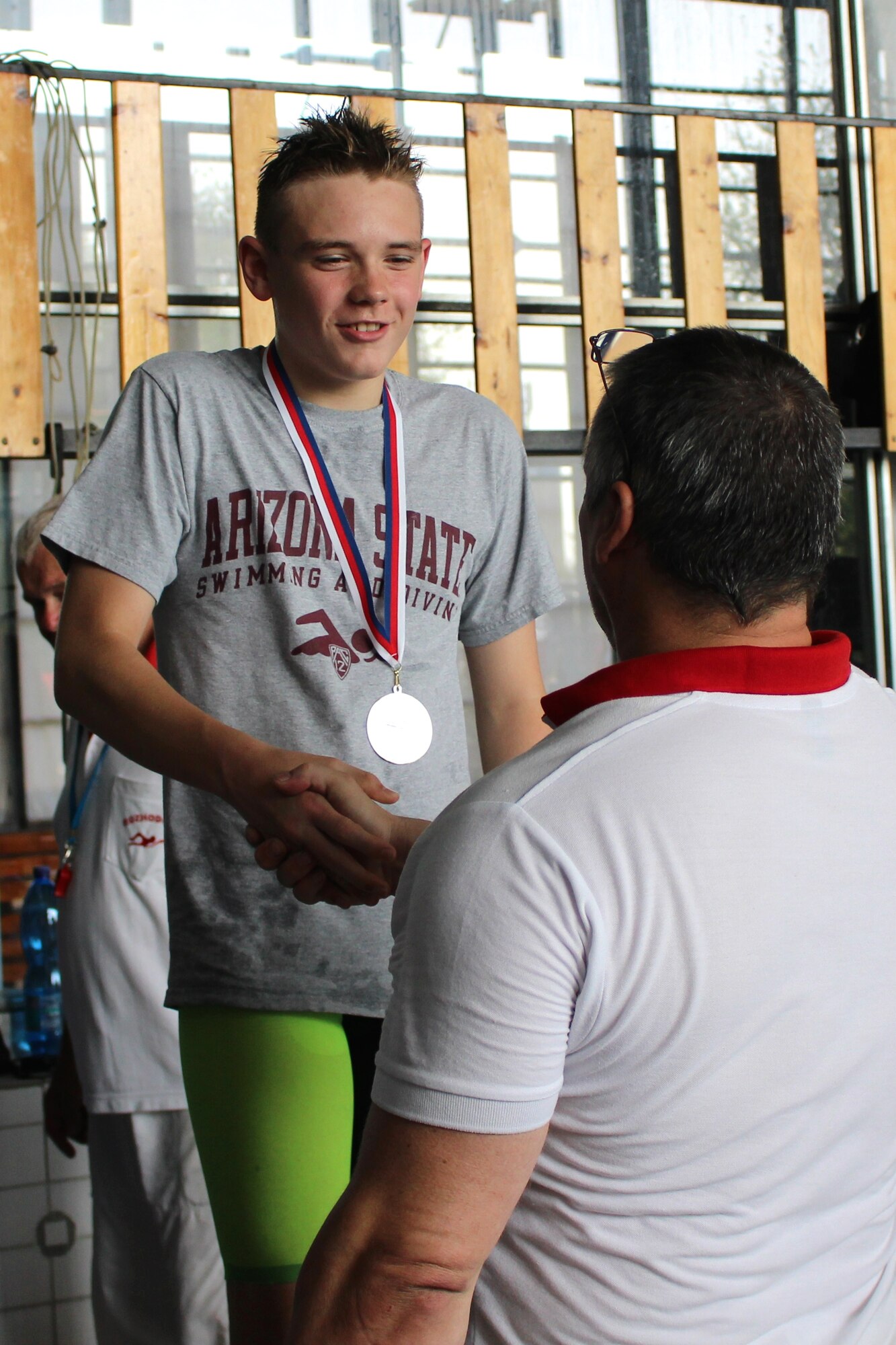 Andrew Hendrickson receives congratulations after winning two gold and two silver medals at the Czech National Swim Competition in Brno, Czech Republic, June 25, 2016. Hendrickson’s medals are payoff for a lot of hard work and dedication from swimming almost 400 miles in the Ramstein pool last year, and the result of a strong support system. (Courtesy photo)