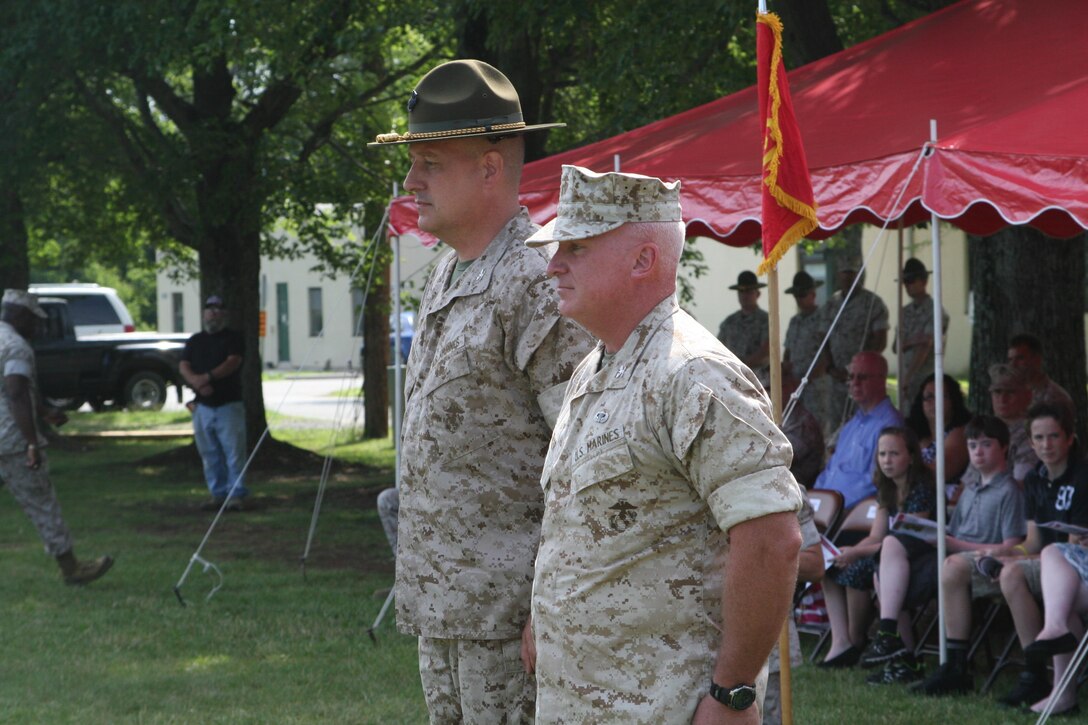 Weapons Training Battalion (WTBN) aboard Marine Corps Base Quantico held a change of command ceremony June 30 at which Col. Timothy Parker relinquished command to Col. Peter Farnum. A unique twist to the change of command ceremony was the passing of the officer's campaign hat in addition to passing the colors. The campaign hat is limited to certain personnel primarily in recruiting, range/marksmanship, and rifle/pistol teams. 