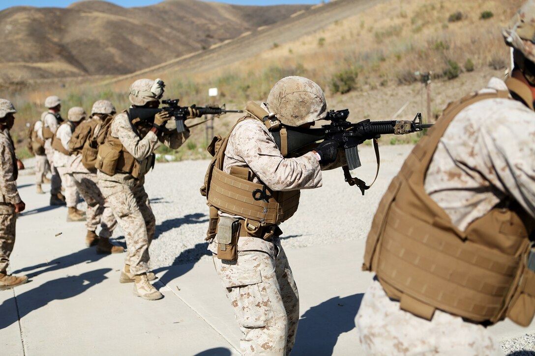 U.S. Marines with Combat Logistics Battalion 1, 1st Marine Logistics Group, fire their weapons in the table three course of fire during the Combat Leader’s Course aboard Camp Pendleton Calif., from June 13-24, 2016. Combat Leader’s Course is an advanced combat skills course instructed by the Combat Skills Training School, designed to teach Marines tactical leadership principles, machine gun functions, combat orders and various other skills. (U.S. Marine Corps photo by Sgt. Carson Gramley/released)