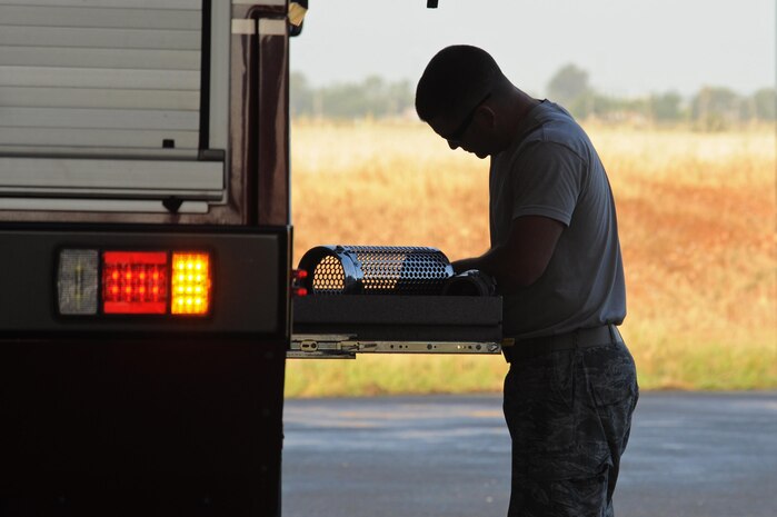 Senior Airman Bradley Willock, 940th Civil Engineer Squadron (CES) fire fighter, conducts a daily check of vehicles and equipment June 30, 2016, at Beale Air force Base, California. The Beale Fire Department's responsibility is to protect base personnel, property and the environment from fire and disaster on the installations approximately 23,000 acres. (U.S. Air Force photo by Senior Airman Ramon A. Adelan)