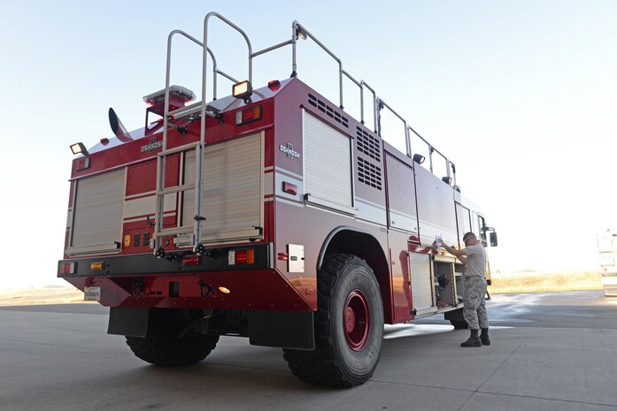 Senior Airman Bradley Willock, 940th Civil Engineer Squadron (CES) fire fighter, conducts a daily check of vehicles and equipment June 30, 2016, at Beale Air force Base, California. The Beale Fire Department's responsibility is to protect base personnel, property and the environment from fire and disaster on the installations approximately 23,000 acres. (U.S. Air Force photo by Senior Airman Ramon A. Adelan)