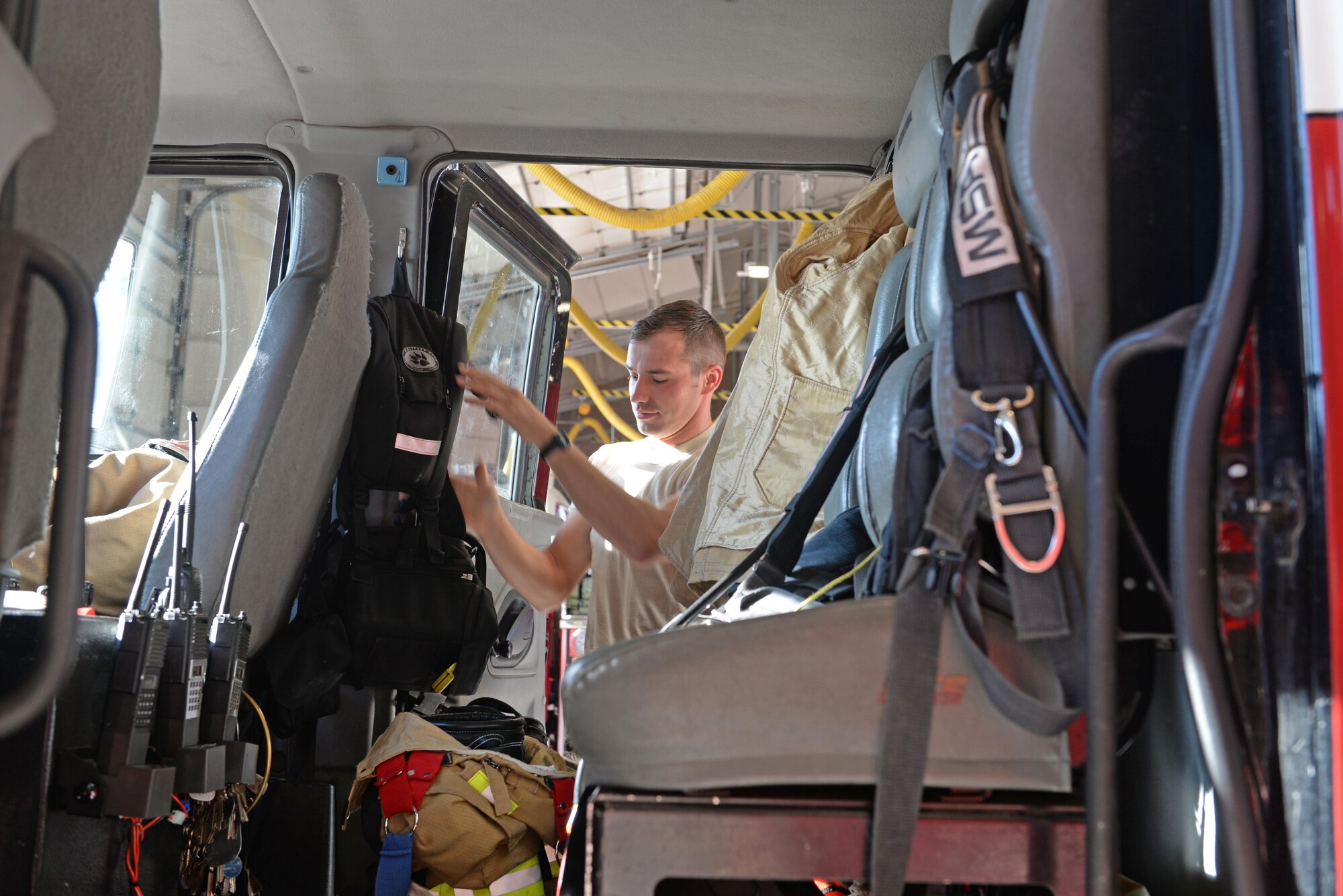 Senior Airman Silviu Feceu, 940th Civil Engineer Squadron (CES) firefighter, conducts daily checks of vehicles and equipment June 30, 2016, at Beale Air Force Base, California. The Beale Fire Department's responsibility is to protect base personnel, property and the environment from fire and disaster on the installations approximately 23,000 acres. (U.S. Air Force photo by Senior Airman Ramon A. Adelan)