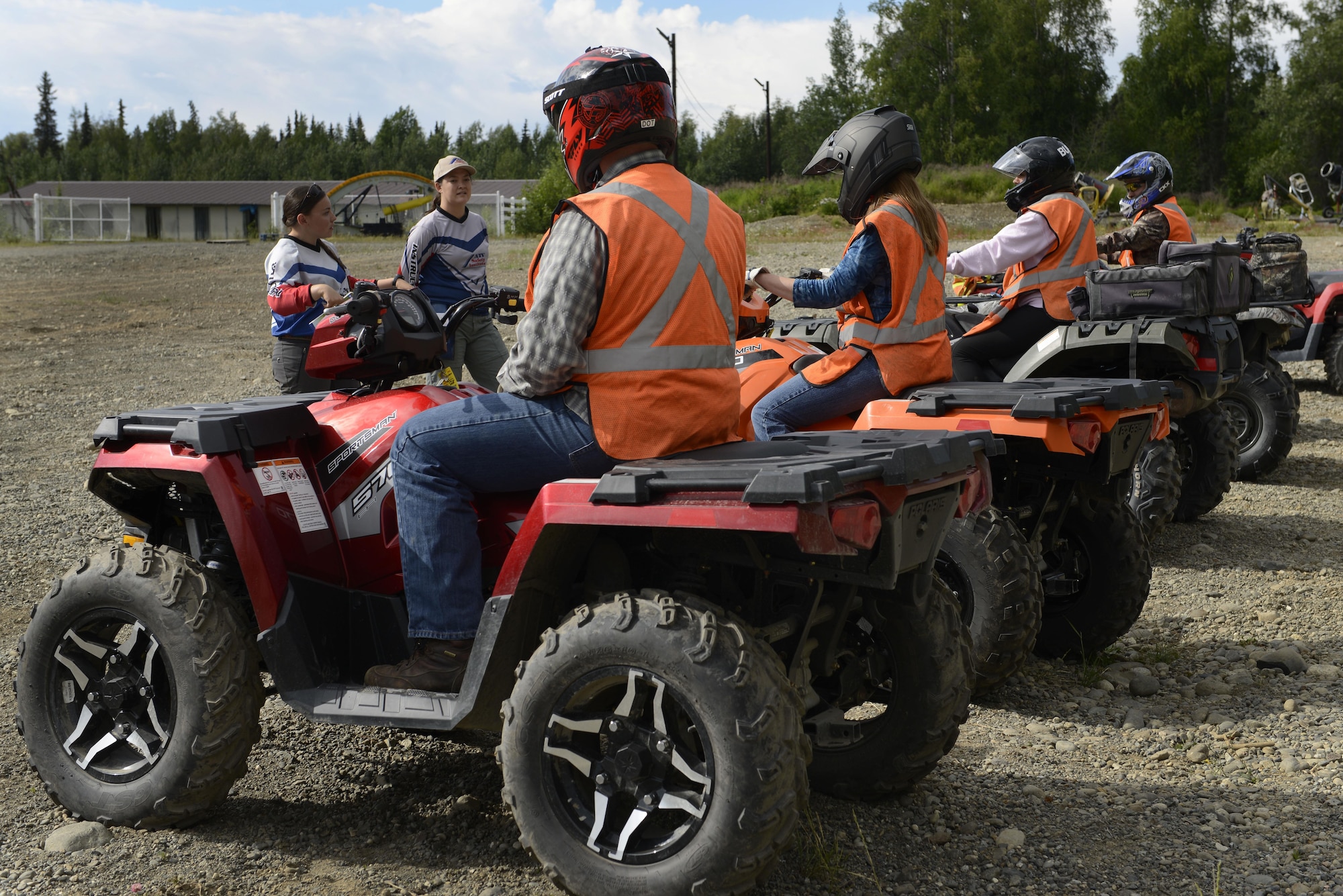 Participants learn proper ways to mount an all-terrain vehicle during an ATV safety course at the Hillberg Ski Resort at Joint Base Elmendorf-Richardson, June 29, 2016. During the class, students learned to improve safety and manage risks while riding. (U.S. Air Force photo by Airman 1st Class Valerie Monroy)