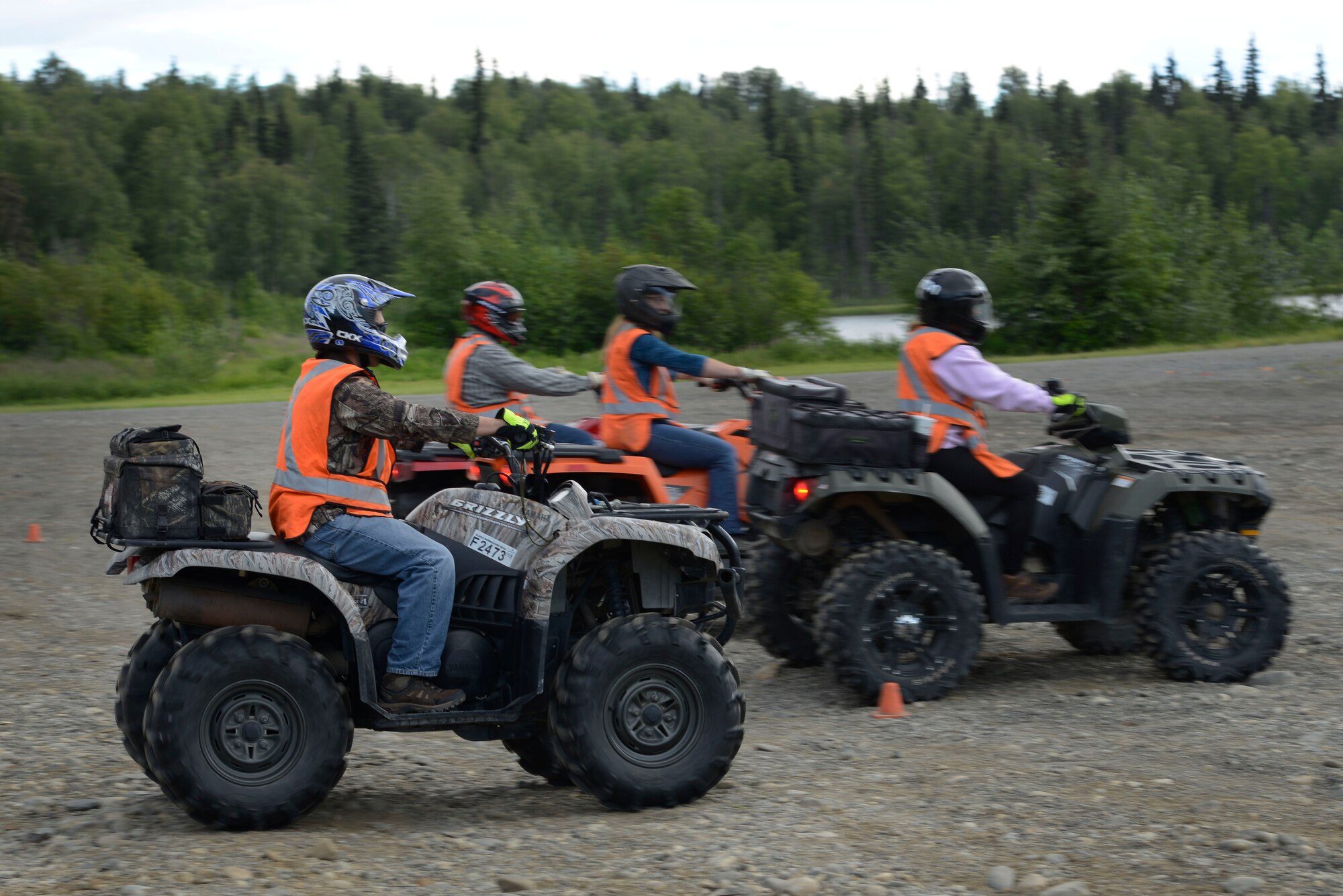 Students learn how to brake safely during an all-terrain vehicle safety course at the Hillberg Ski Resort at Joint Base Elmendorf-Richardson, June 29, 2016. The Outdoor Recreation Center offers a recurring all-terrain vehicle safety course during the summer for service members and civilians on base to acquire their ATV Safety Institute certification card which allows them to ride legally on base. (U.S. Air Force photo by Airman 1st Class Valerie Monroy)