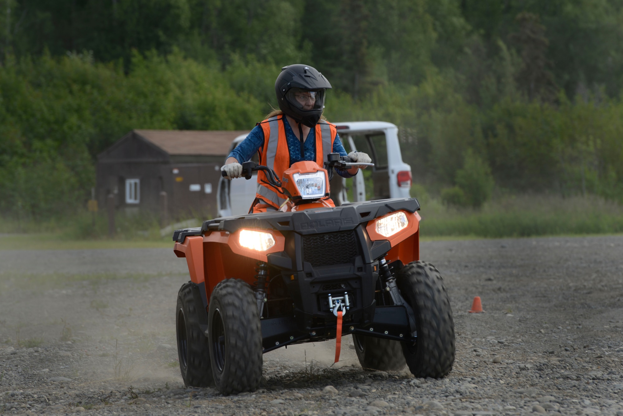 Donna Johnston, a recent all-terrain vehicle enthusiast, practices riding during an ATV safety course at the Hillberg Ski Resort at Joint Base Elmendorf-Richardson, June 29, 2016. The Outdoor Recreation Center offers a recurring all-terrain vehicle safety course during the summer for service members and civilians on base to acquire their ATV Safety Institute certification card which allows them to ride legally on base. (U.S. Air Force photo by Airman 1st Class Valerie Monroy)