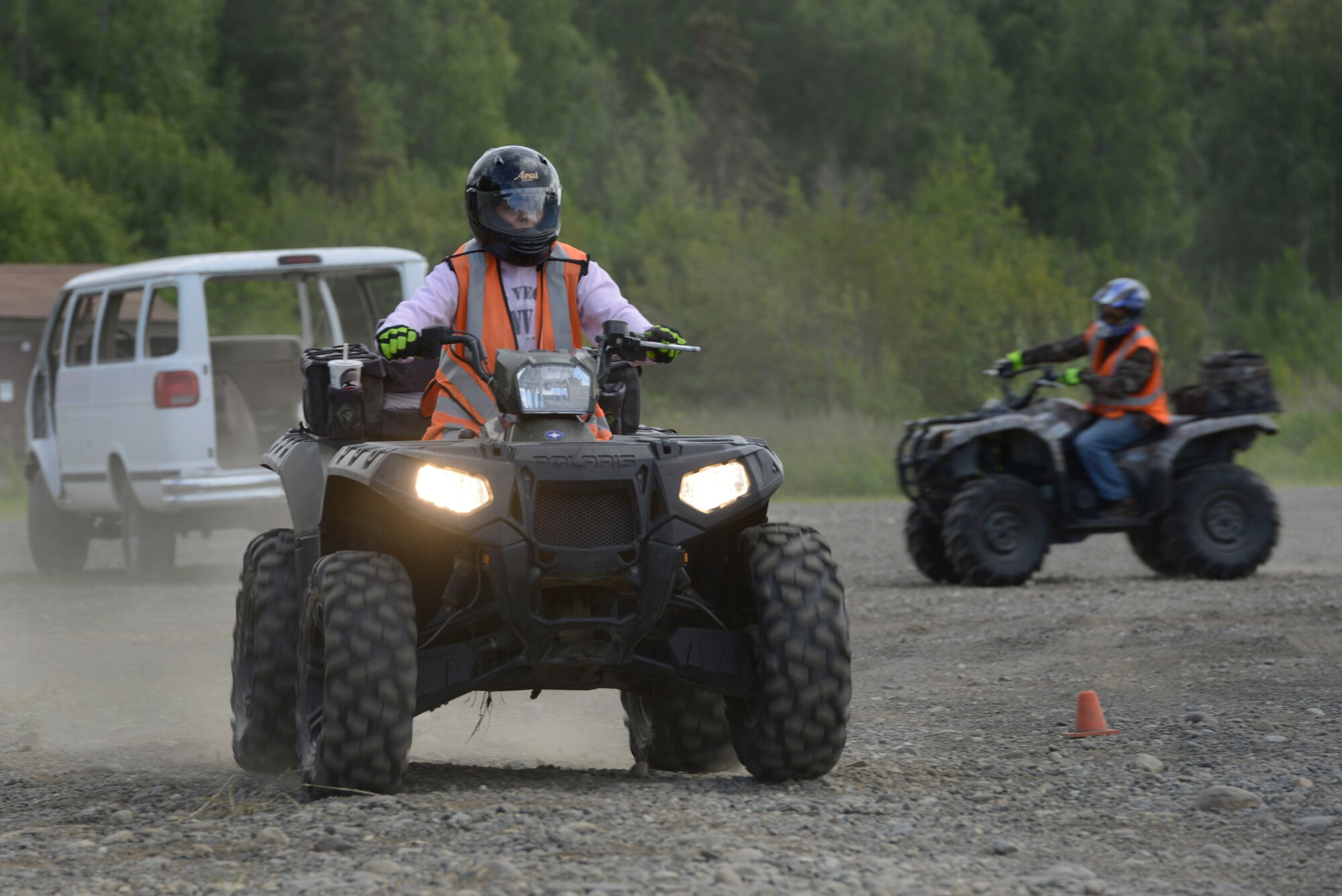 Roseann Coyle, a new all-terrain rider, comes out of a turn during an ATV safety course at the Hillberg Ski Resort at Joint Base Elmendorf-Richardson, June 29, 2016. The state of Alaska has few paved roads and highways, making off-road transportation practical for many off-duty activities. Roseann is the wife of Sgt. 1st Class Chris Coyle, with the 4th Infantry Brigade Combat Team (Airborne), 25th Infantry Division, 1st Squadron (Airborne), 40th Cavalry Regiment. (U.S. Air Force photo by Airman 1st Class Valerie Monroy)