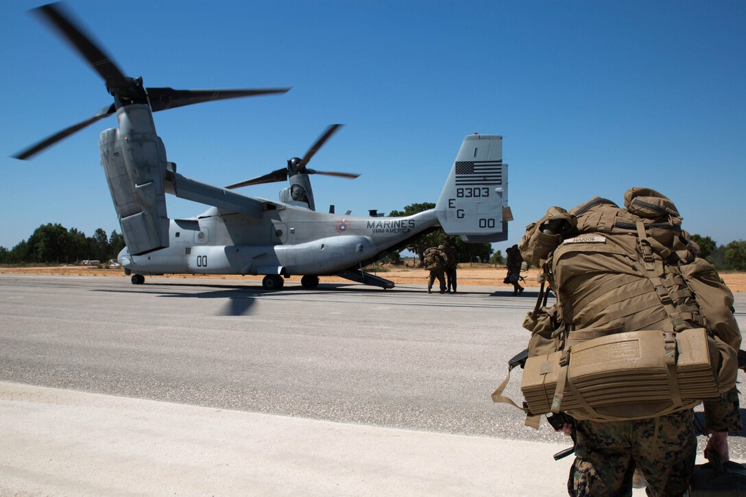U.S. Marines assigned to Special Purpose Marine Air-Ground Task Force-Crisis Response-Africa board an MV-22 Osprey to kick off Exercise Orion 16 at military training area Tancos, Portugal, June 22, 2016. Marine Corps photo by Staff Sgt. Tia Nagle