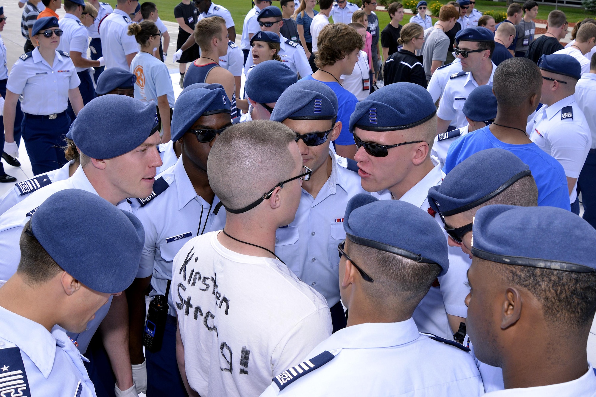 Members of the cadet training cadre at the U.S. Air Force Academy surround a cadet trainee June 30, 2016, at the U.S. Air Force Academy. (U.S. Air Force photo/Jason Gutierrez)