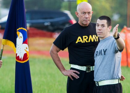 Army Reserve Staff Sgt. Will Myers, 26, explains a run route to LTG Charles D. Luckey, the 33rd Chief of Army Reserve and 8th Commanding General U.S. Army Reserve Command, before an early-morning run around North Post on Fort Bragg, N.C., on July 6, 2016. After the run, Luckey spent several minutes talking to Soldiers and closed out the formation with the Soldiers’ Creed. Myers is  a paralegal noncommissioned officer from Atascadero, Calif. Luckey was sworn in June 30, 2016 as the senior leader for nearly 200,000 Army Reserve Soldiers across all 50 states and U.S. territories. (Army Photo by Master Sgt. Mark Bell / Released)