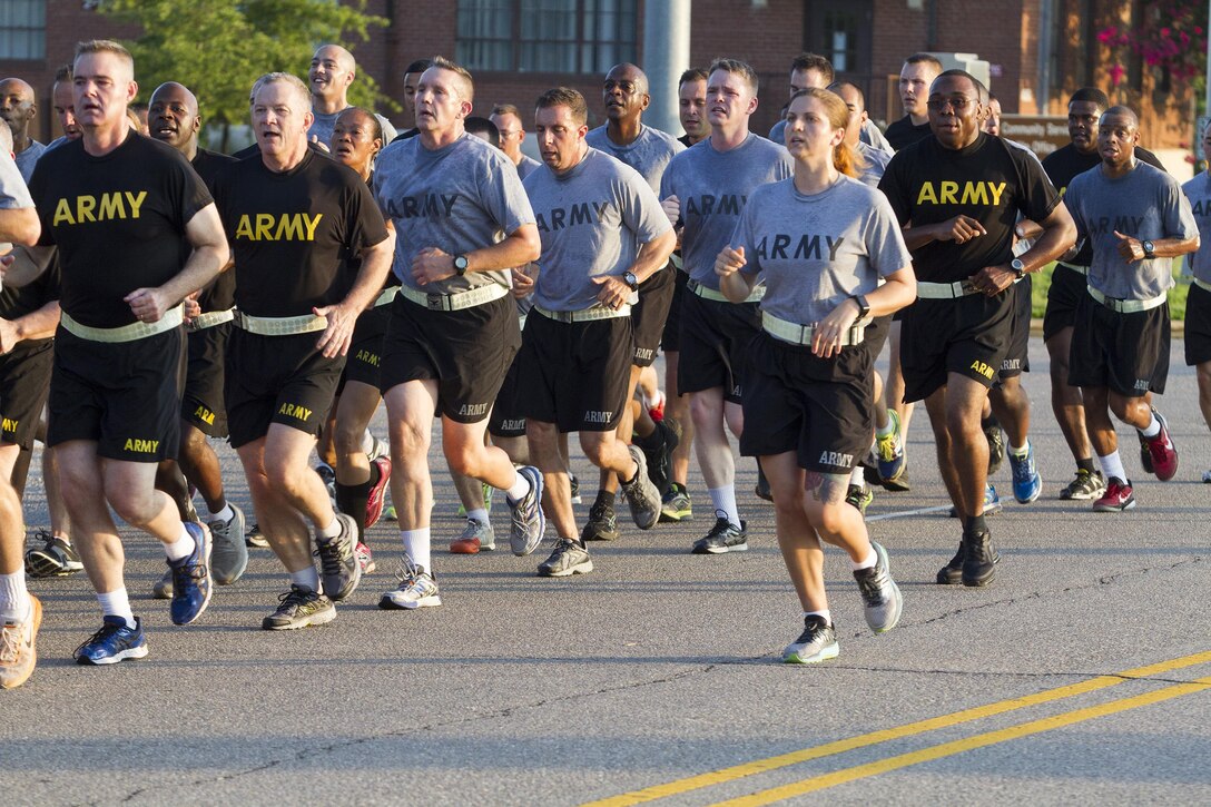 Army Reserve Staff Sgt. Katelyn A. Hammes, 24, leads Soldiers assigned to Headquarters and Headquarter Company, USARC, on an early-morning run around North Post on Fort Bragg, N.C., on July 6, 2016.  Hammes is a Military Law noncommissioned officer from San Diego, Calif.  (Army Photo by Master Sgt. Mark Bell / Released)
