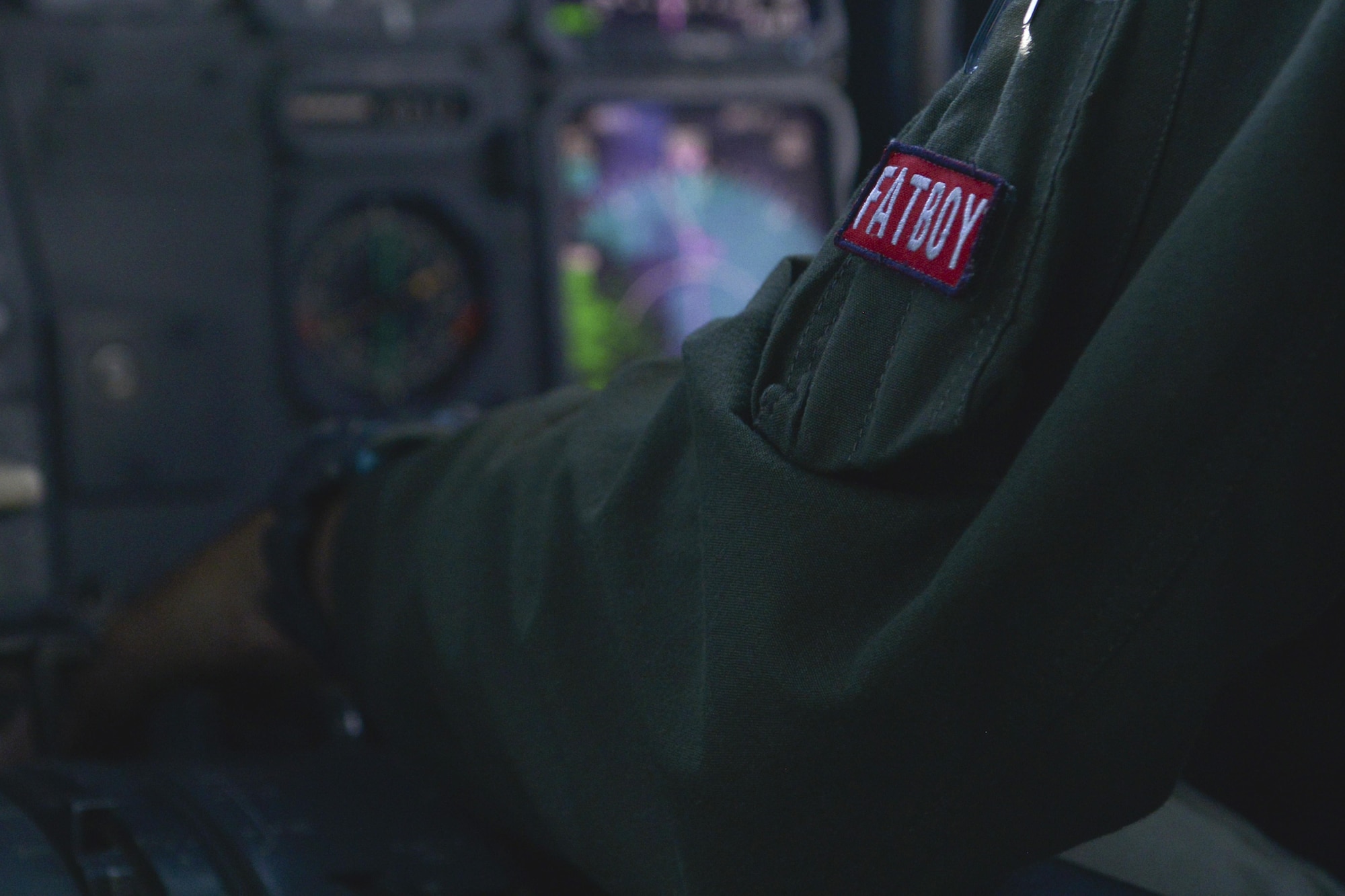 A U.S. Air Force KC-10 Extender pilot dons the “Fat Boy” patch as he supports the F-35A Lightning II’s first transatlantic aerial refueling over the Atlantic Ocean June 30, 2016. “Fat Boy” refers to pilots’ whose first operational aircraft assignment is to fly the KC-10 Extender, which is considered a heavy aircraft due to its size and capabilities. (U.S. Air Force photo by Staff Sgt. Natasha Stannard)