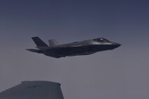 A U.S. Air Force F-35A Lightning II flies alongside a K-10 Extender over the Atlantic Ocean for the F-35A’s first transatlantic flight June 30, 2016.The Extender, which is based out of Travis Air Force Base, Calif., refueled the Lightning on its way to England for the Royal International Air Tattoo. (U.S. Air Force photo by Staff Sgt. Natasha Stannard)