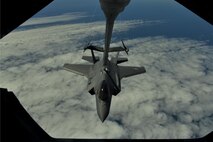 A U.S. Air Force F-35A Lightning II is refueled by a KC-10 Extender over the Atlantic Ocean on the way to Fairford, England, June 30, 2016. This flight marked the first U.S. transatlantic flight of the F-35A. (U.S. Air Force photo by Staff Sgt. Natasha Stannard)
