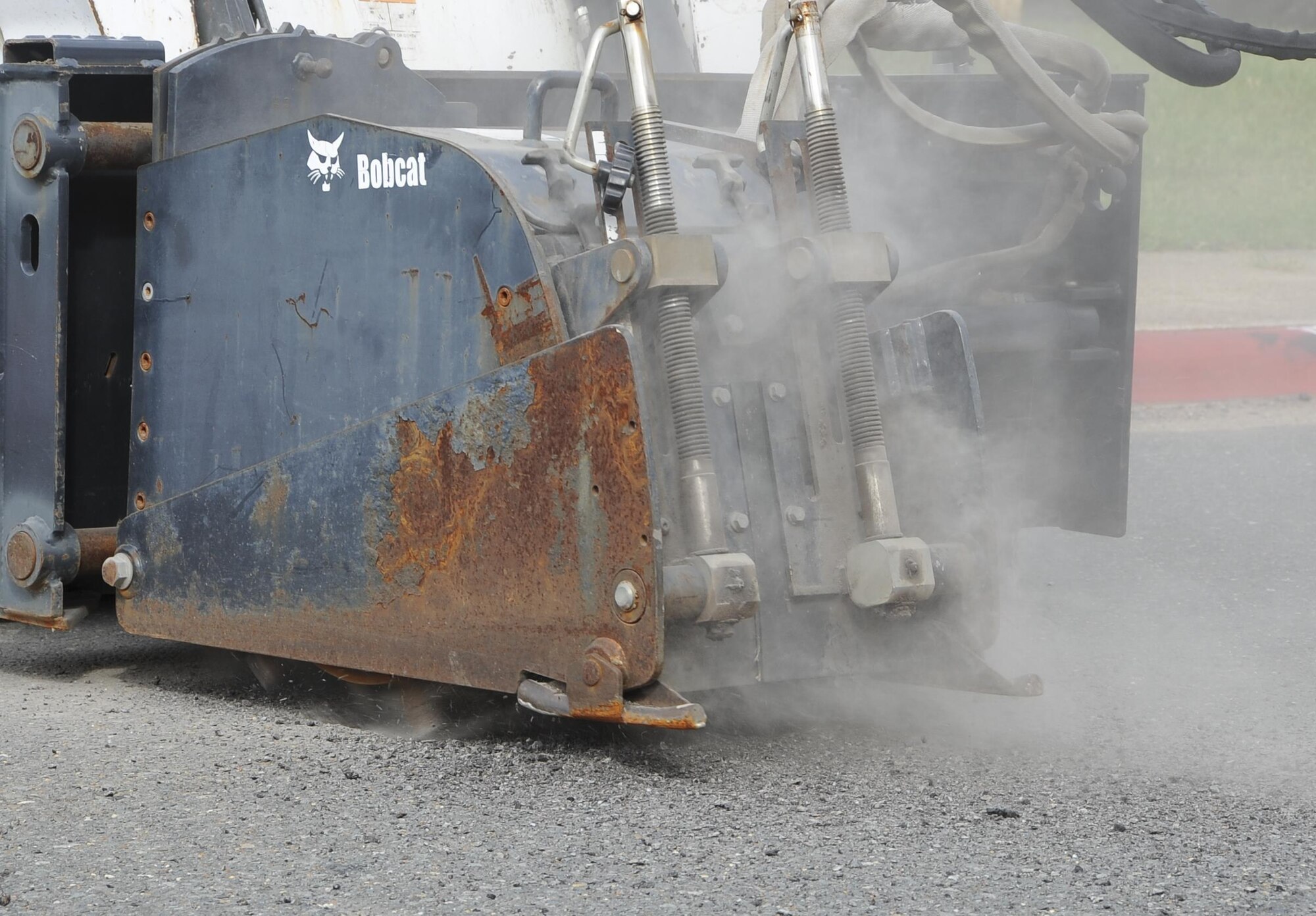 Airmen from the 2nd Civil Engineer Squadron, Pavement and Heavy Equipment Flight, begin road construction at the Exchange at Barksdale Air Force Base, La., July 5, 2016.  Facility Managers can contact the 2nd CES to fill out a request if they notice any potholes near their facility. For more information, contact the customer service section at 456-3071. (U.S. Air Force photo/Airman 1st Class Stuart Bright)