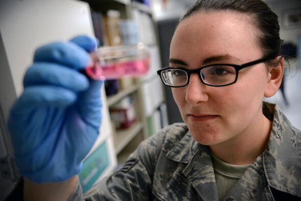 Senior Airman Samantha Parkhurst, 47th Medical Operations Squadron bioenvironmental engineering technician, looks at a water sample at the medical clinic on Laughlin Air Force Base, Texas, June 28, 2016. The bioenvironmental team tests Laughlin's base and marina water monthly to ensure safety. (U.S. Air Force photo/Senior Airman Ariel D. Partlow)