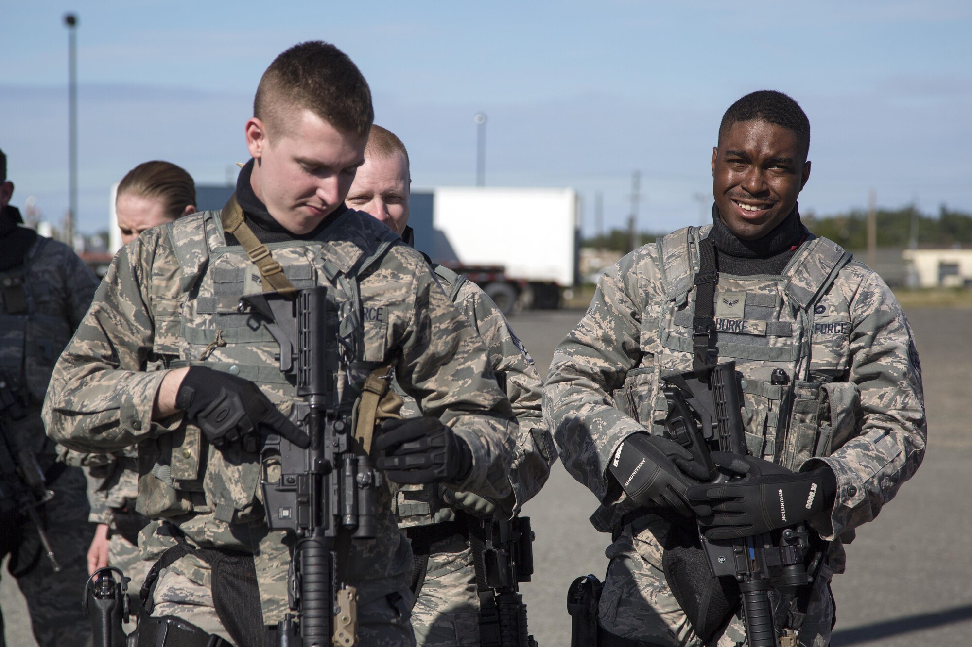 U.S. Air Force security forces personnel, assigned to the 673d Security Forces Squadron, prepare to conduct high risk response training at Joint Base Elmendorf-Richardson, Alaska, June 29, 2016. High risk response training provides security forces personnel an intensive, hands-on course based in various real-life scenarios emphasizing effective tactics to engage and eliminate active shooters or other threats. (U.S. Air Force photo/Alejandro Pena)