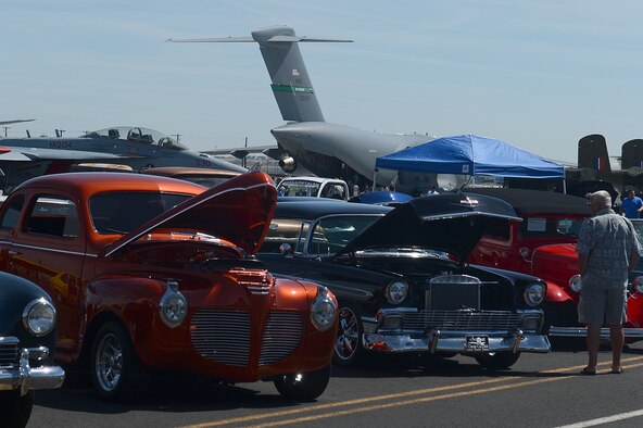 Classic cars are displayed during the 50th Anniversary of the Port of Moses Lake July 1, 2016 at Grant County International Airport, Wash. In addition to viewing the aircraft static display, there was also a classic car show, food, vendors, and music. (U.S. Air Force photo/Senior Airman Divine Cox)